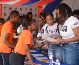 Students at booth during orientation