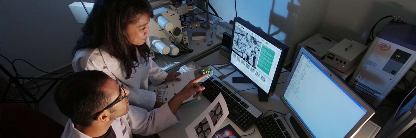 Lab Technicians at computer