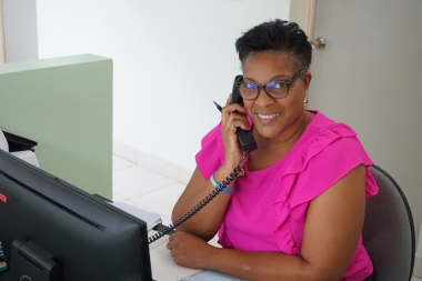 picture of department's staff member on the phone