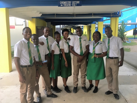 Sixth form students from Old Harbour High School took a quick photo op in the hallway of the Facutly of Science and Technology, the place of study they hope to join in the near future.
