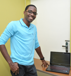 Smiling Student by Computer