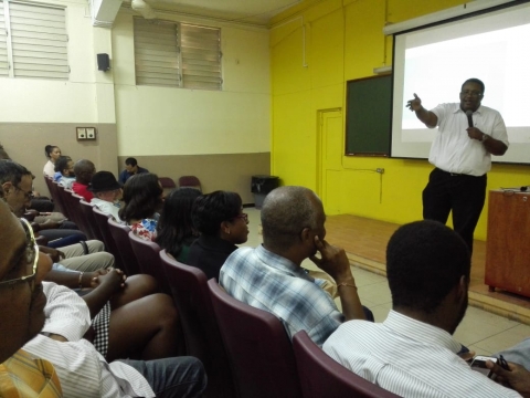 Prof. Taylor speaking to staff members of the Faculty of Science and Technology