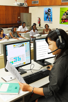 Ms. Tazuko Iijama, delivers a class in upgraded Language Laboratory