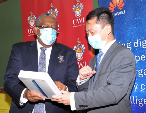 (From left) Pro Vice-Chancellor and Principal of The UWI Mona Campus, Professor Dale Webber and Mr. Andy Deng, Country manager of Huawei Technologies Jamaica Company Limited pictured at the handing over ceremony on Friday, November 6, 2020. 