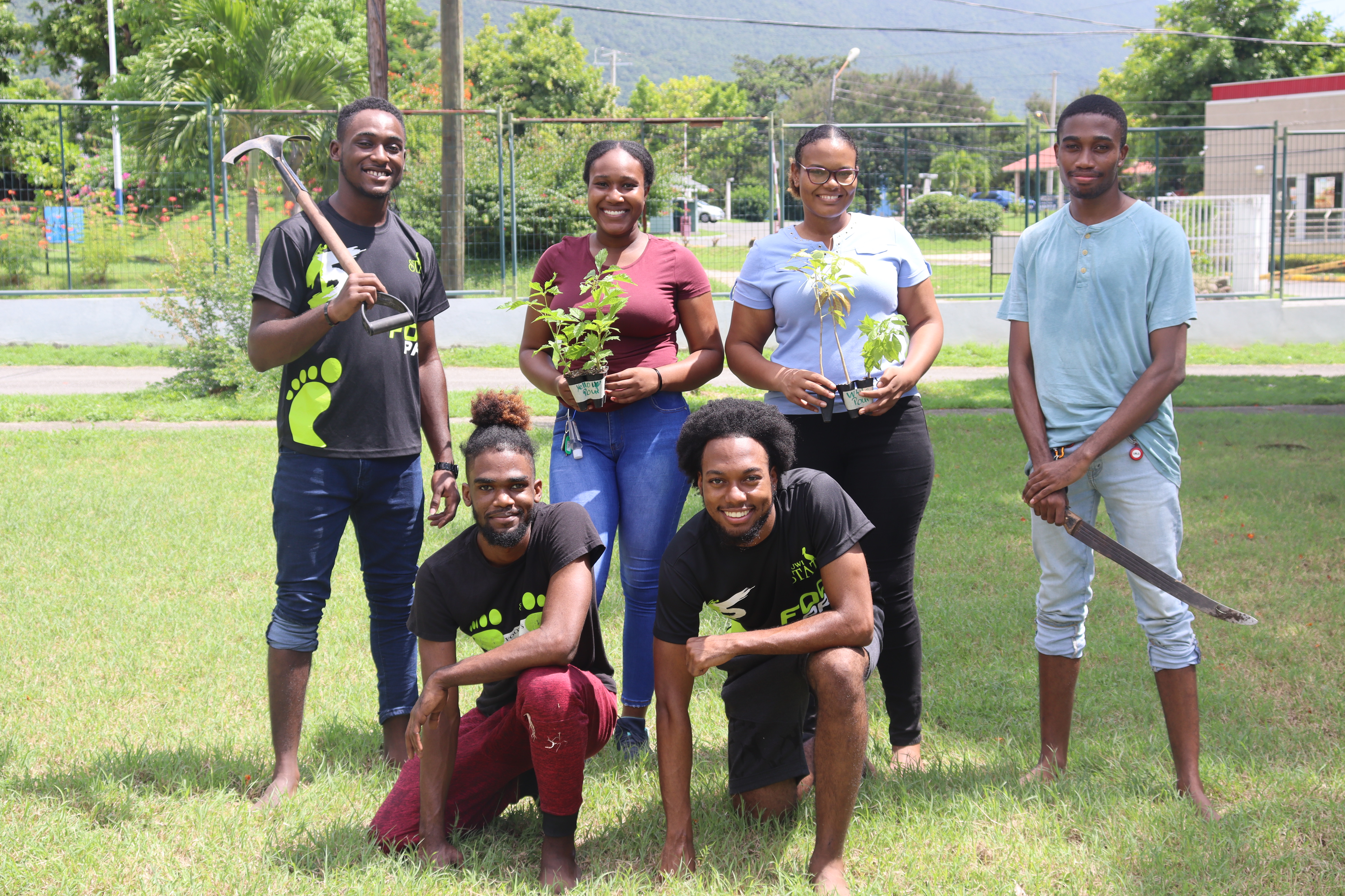 In this file photo dated October 9, 2021, UWI Students Today Alumni Tomorrow (UWI STAT) ambassadors participate in a tree-planting exercise to mark National Tree Planting Day. Cassandra Brenton Photo