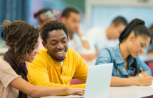 Undergraduate students at computer